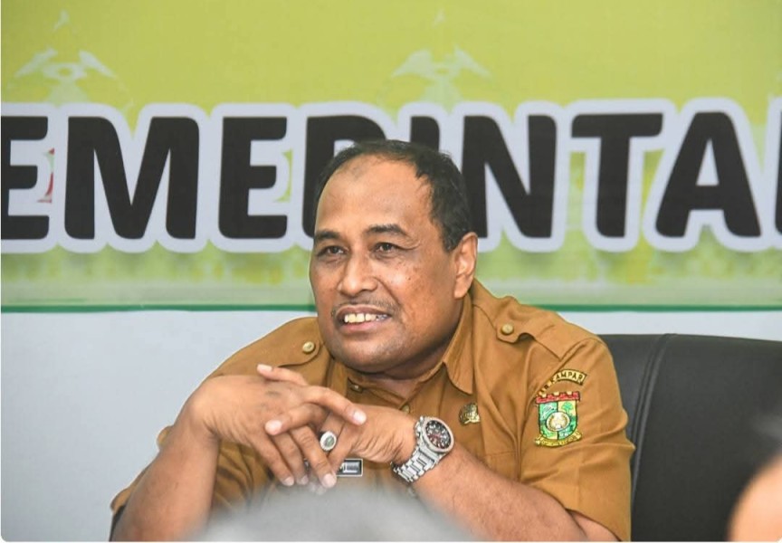 Bupati Kampar Ikuti Rapat Pengendalian Inflasi dan Rakor Evaluasi Program 3 Juta Rumah Secara Virtual